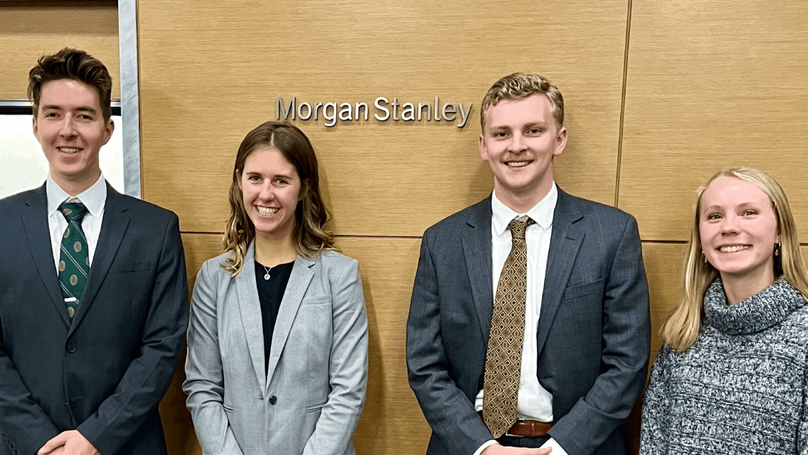GSB Students stand in front of Morgan Stanley sign