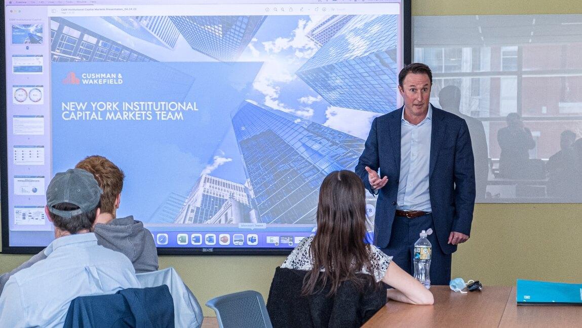 adam spies, grossman school of business