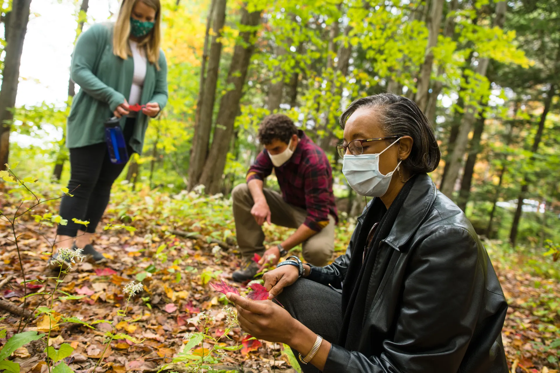 Gund researchers Lesley-Ann Dupigney-Giroux (foreground), Gillian Galford, and Joshua Faulkner are leading the latest study of climate change in Vermont. 