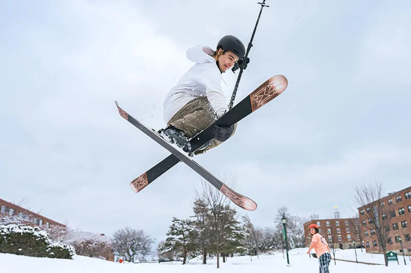 A skier does some freestyle.