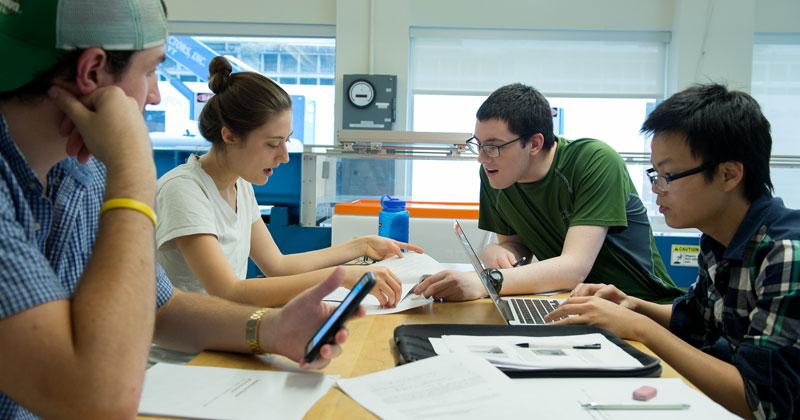 Students collaborate on a project during a lab