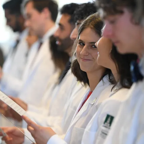 Medical student on White Coat day smiling