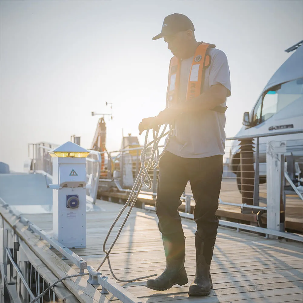 Taylor Resnick holding rope on a dock