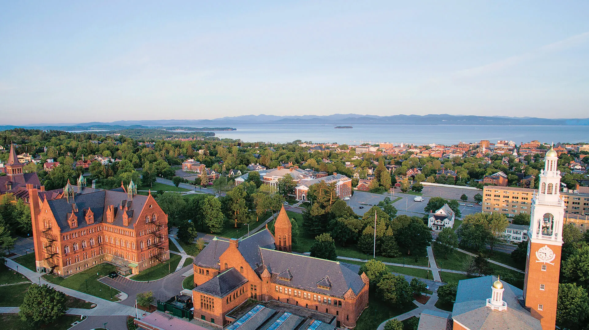 aerial view of UVM campus and lake champlain
