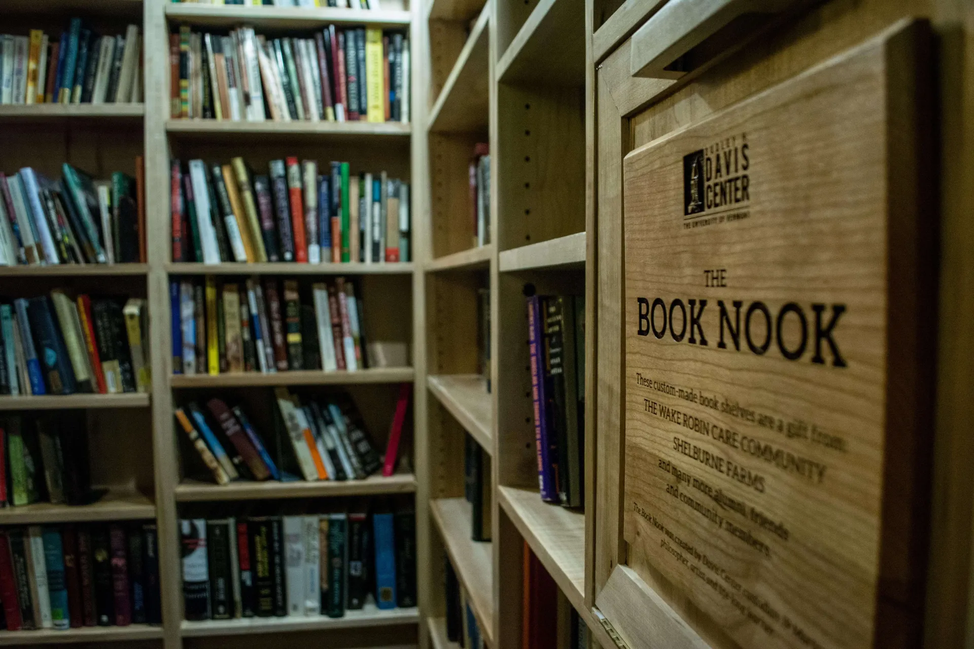 The book nook inside the Davis Center, a popular reading and hangout spot, and a little free library.