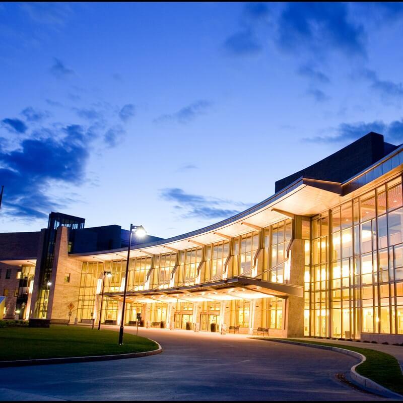 modern building lit up in the evening