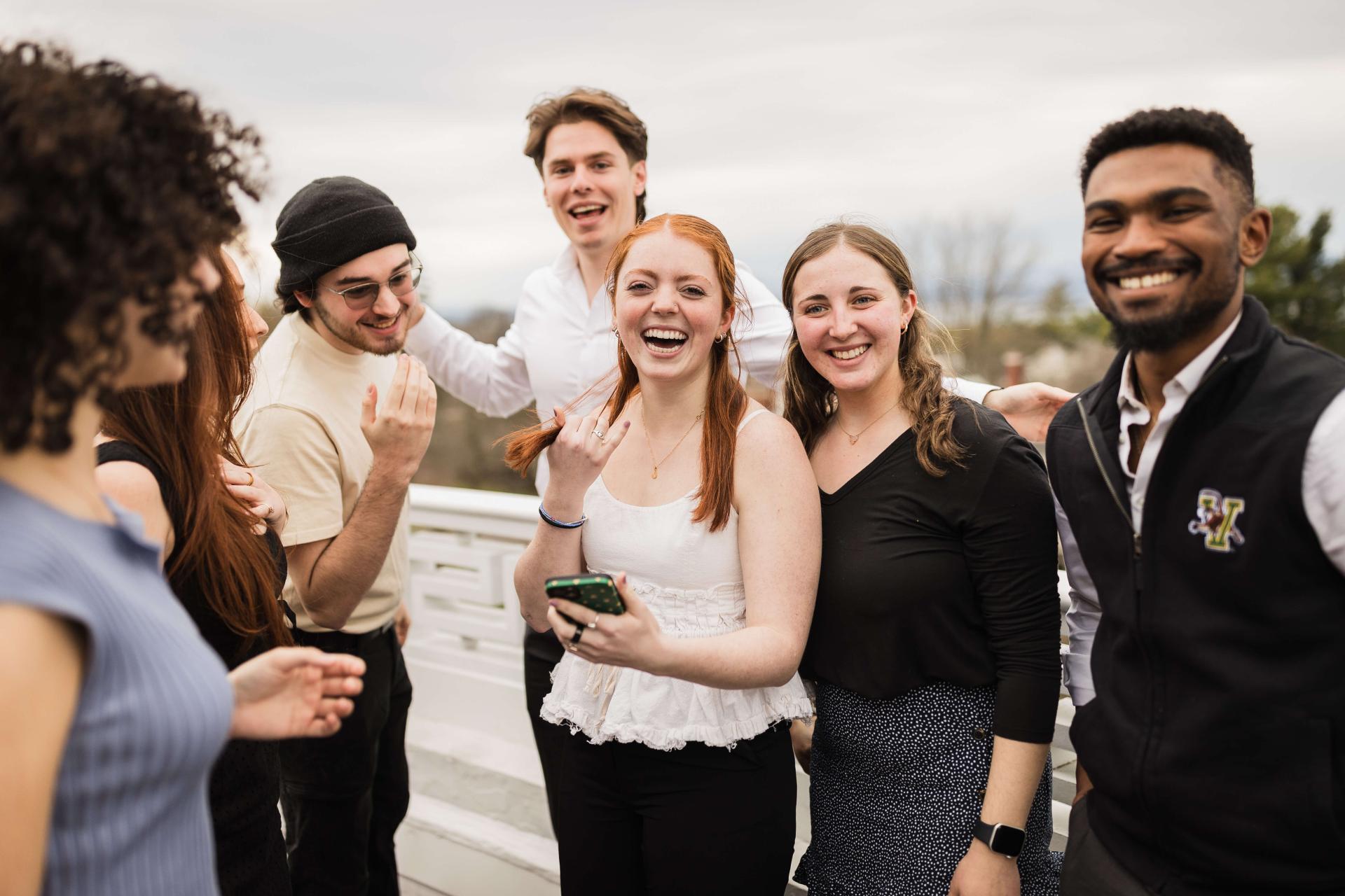 7 student senators are pictured standing in an organic group and smiling