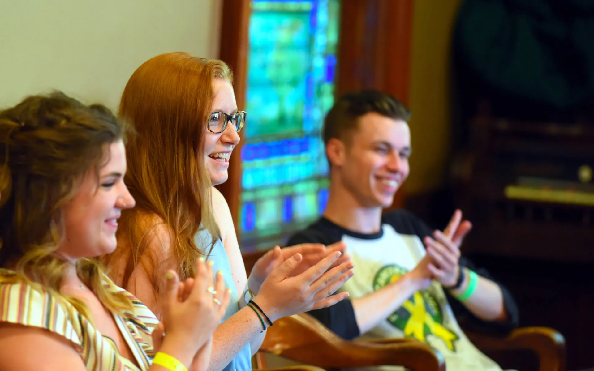 Social work students clapping as they enjoy a senior celebration group activity