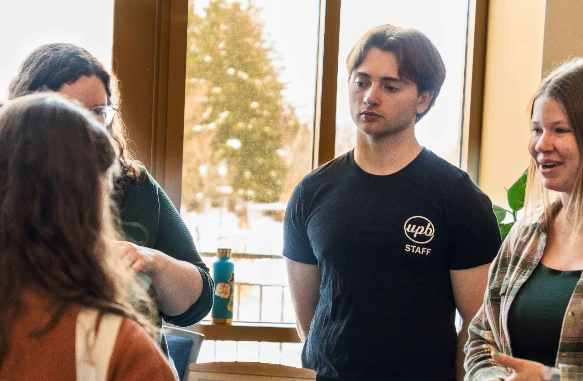 Photo of a student inquiring about a position at student life