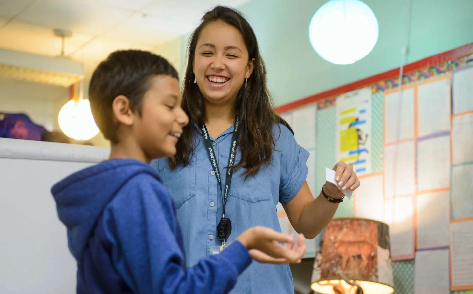 Student teacher works with middle schooler during internship placement at Winooski Middle School.