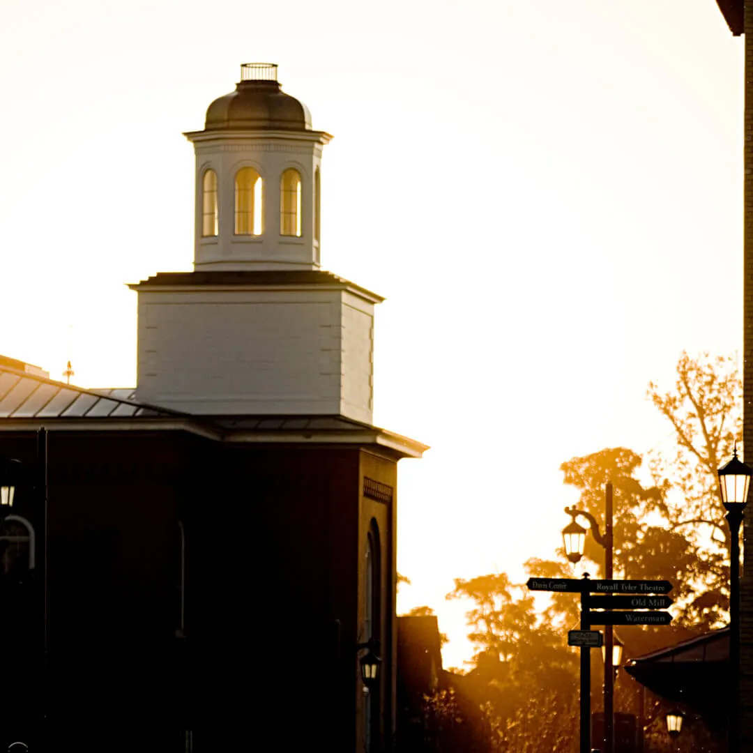 A sunrise behind Pomeroy Hall