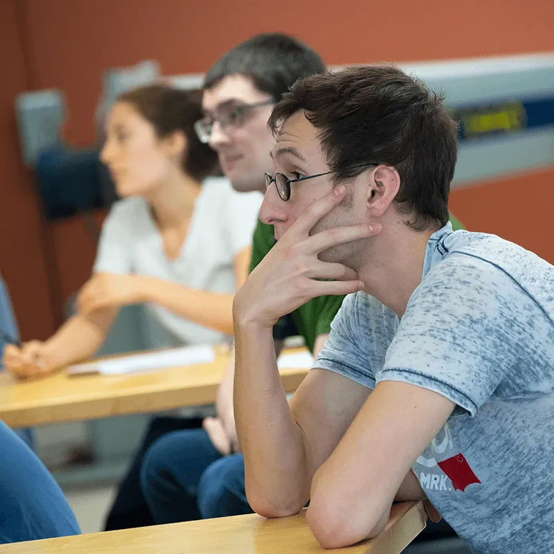 student intently focused on something at the front of their gaze