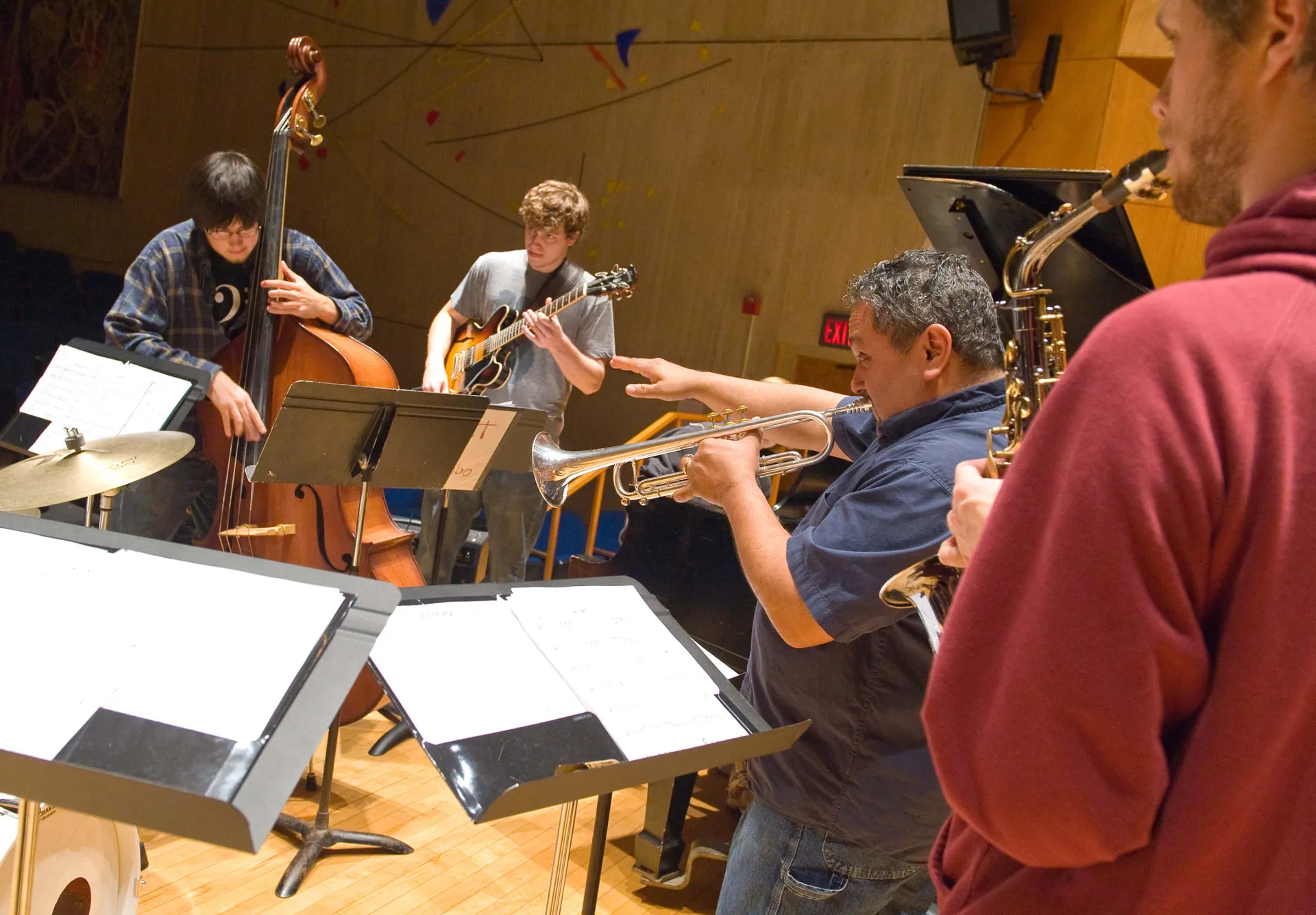 Musical group plays together.