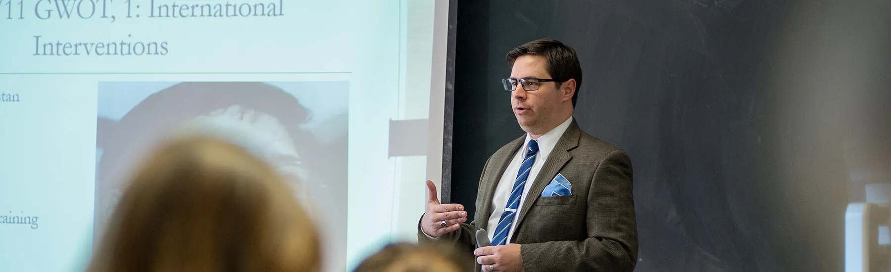 Professor presenting to the class of students