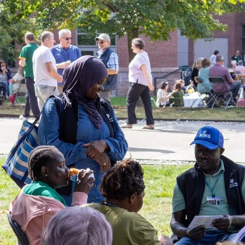 UVM staff members gather across Andrew Harris Commons.
