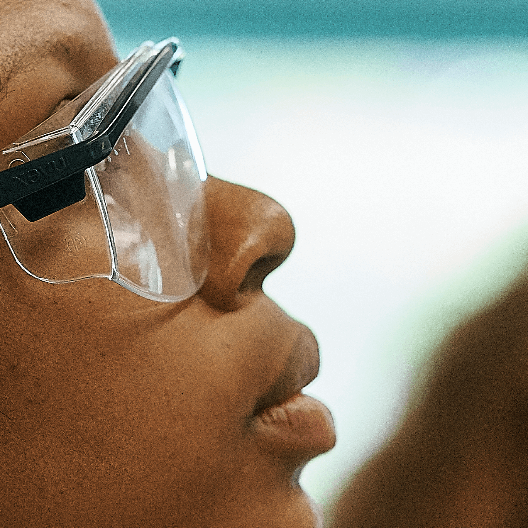 Girl's face with safety glasses