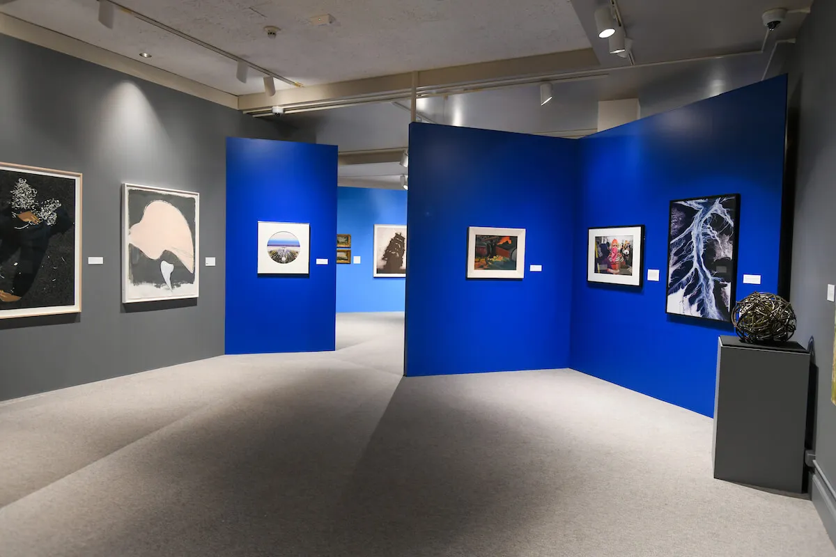 Full of artwork showcases on the wall