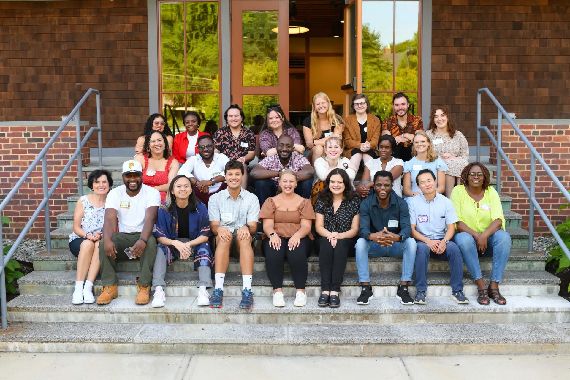 HESA students and faculty together as a group in front of the UVM Alumni House.