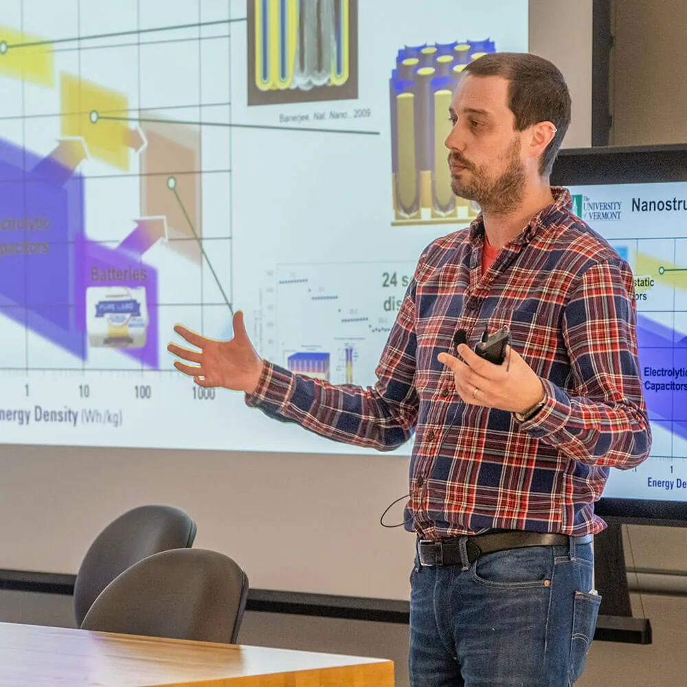 Physics faculty member Alex Kozen sharing presentation on new research
