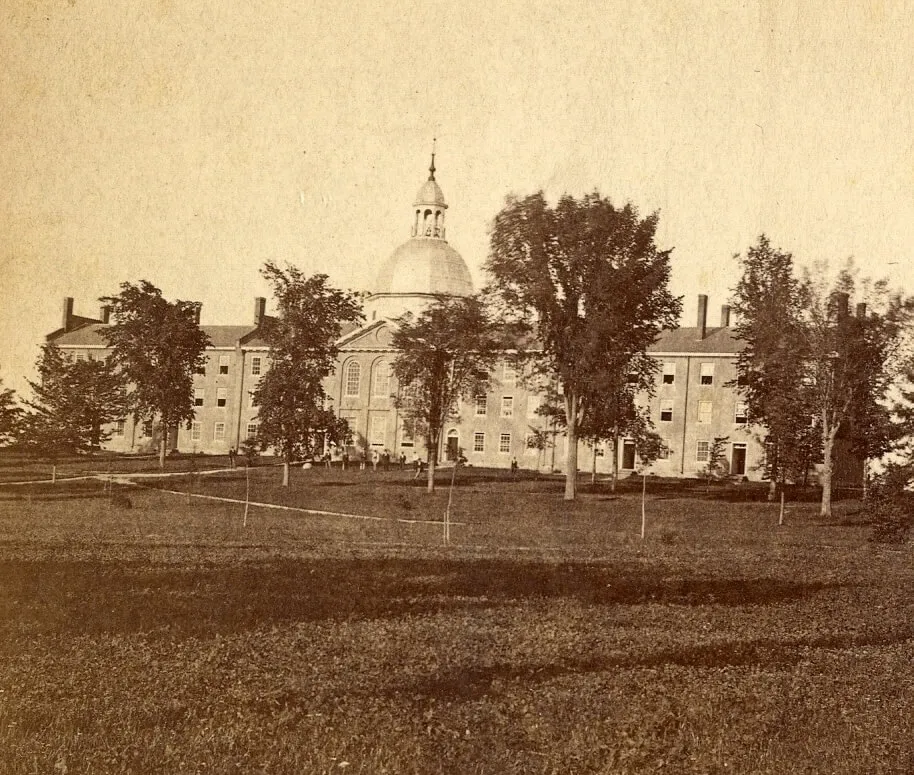 Historic picture of campus green and buildings.