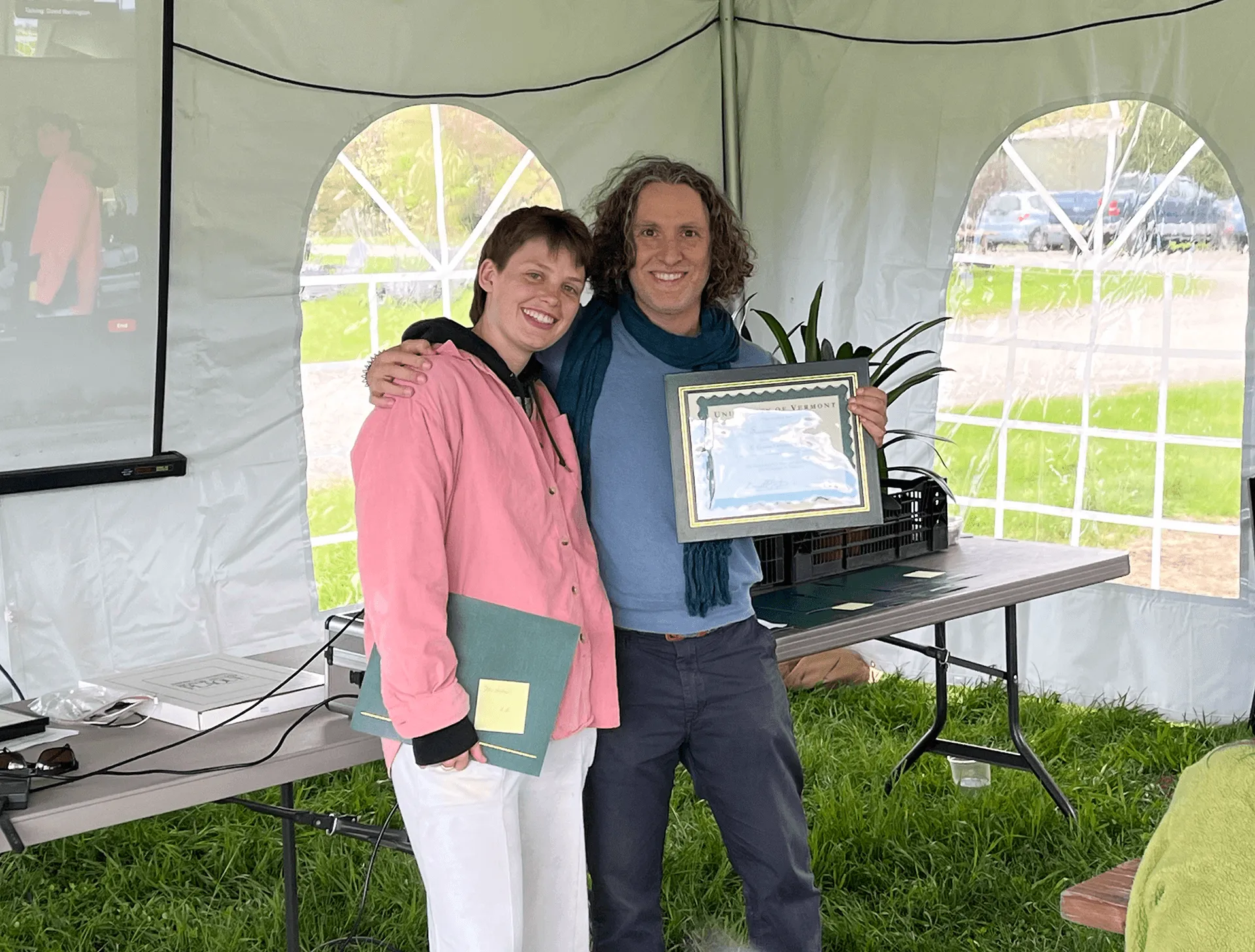 Faculty member presents award to student