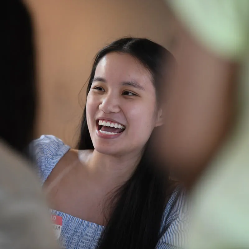young person laughing