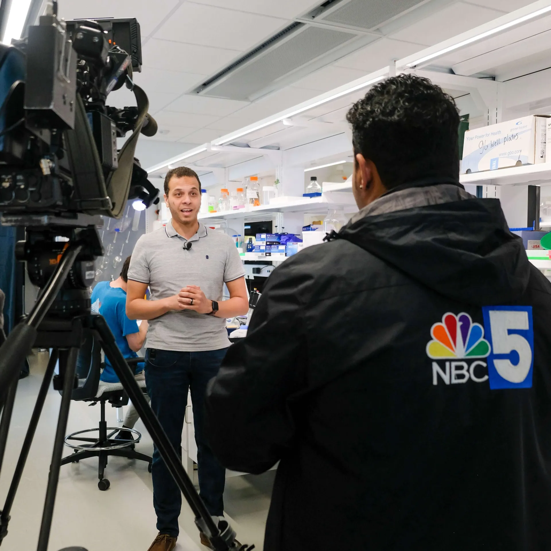 Image captured during a news interview with a researcher inside.