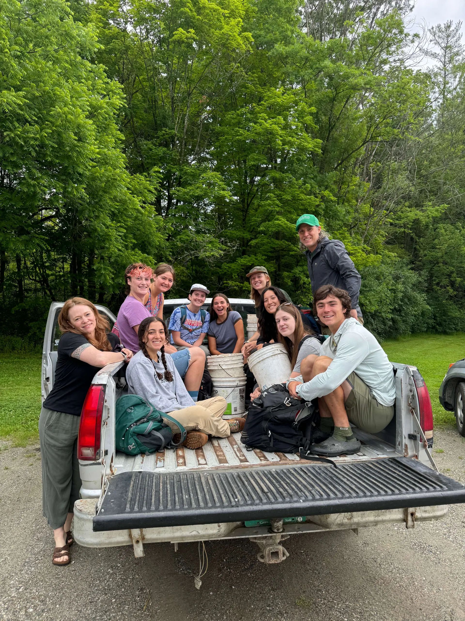 AX fellows in bed of truck