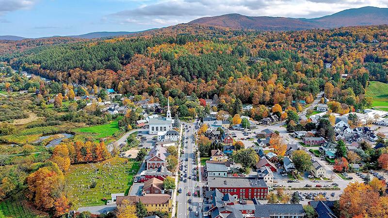 Aerial view of a small Vermont town in the fall