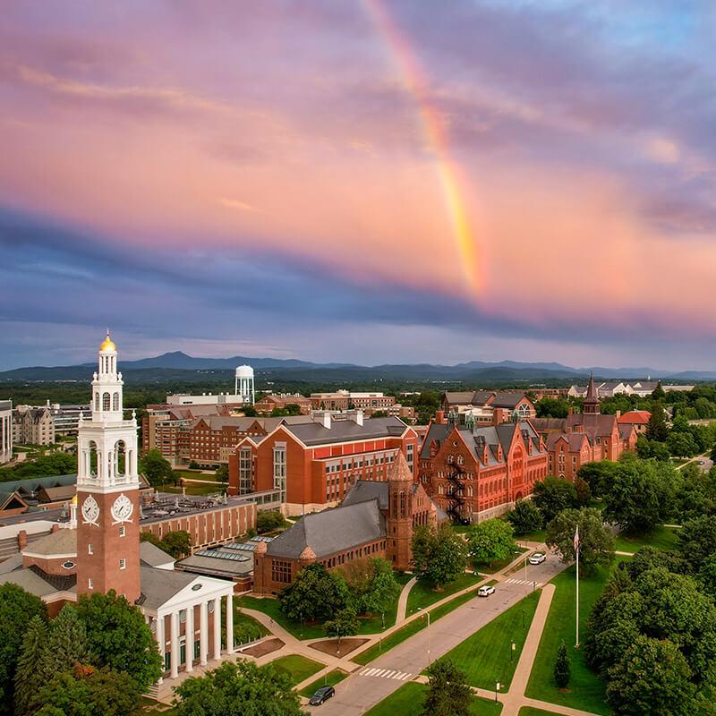 drone shot of university row with a rainbow over campus