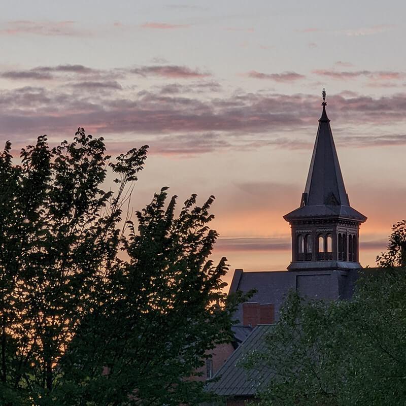 sunset sillouette of the old mill tower