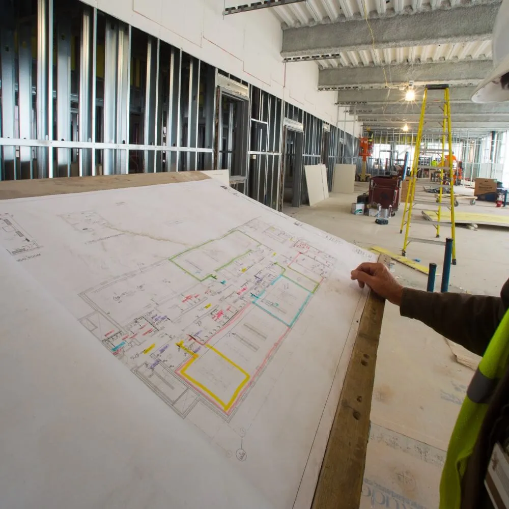 construction drawing of floorplan marked up in colorful ink