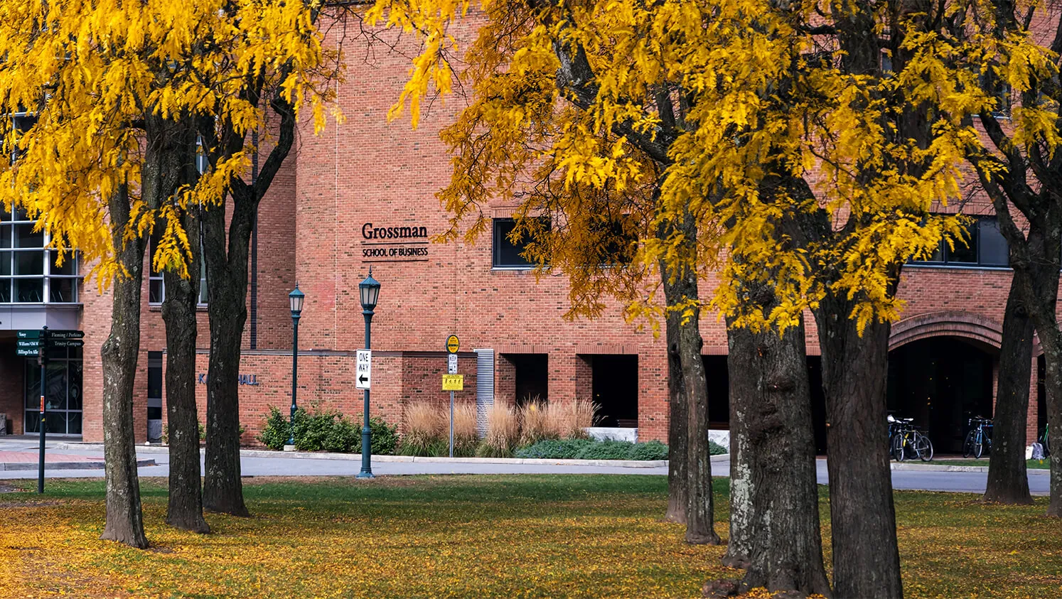 The exterior of the Grossman School, a large brick building.