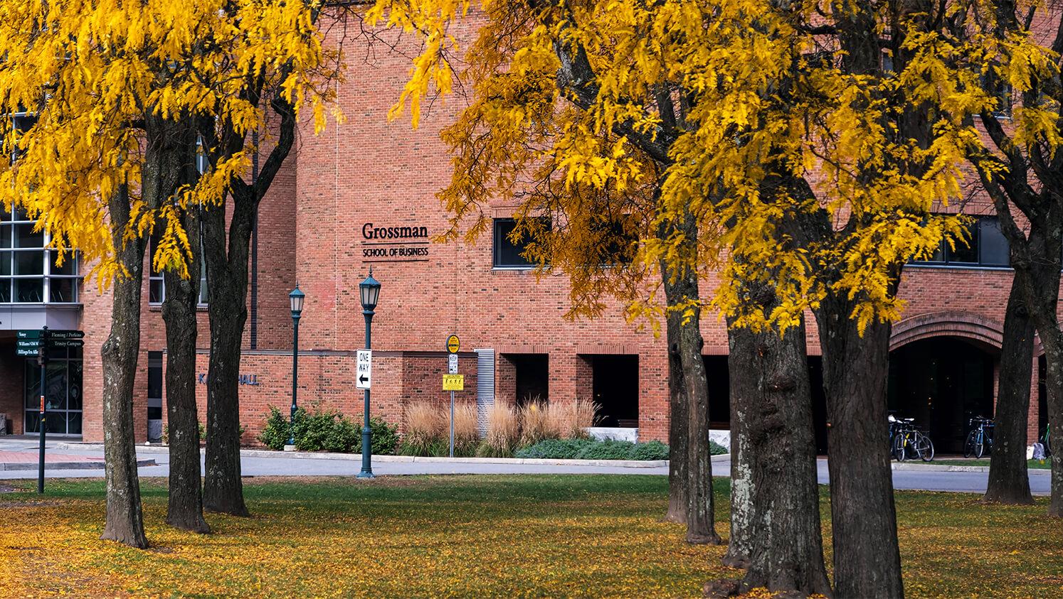 The exterior of the Grossman School, a large brick building.