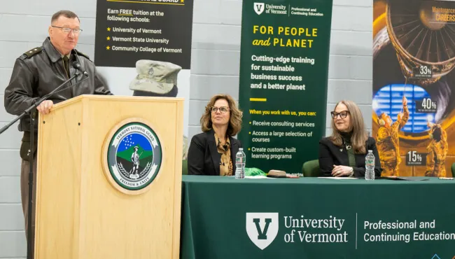 Man speaking at podium.