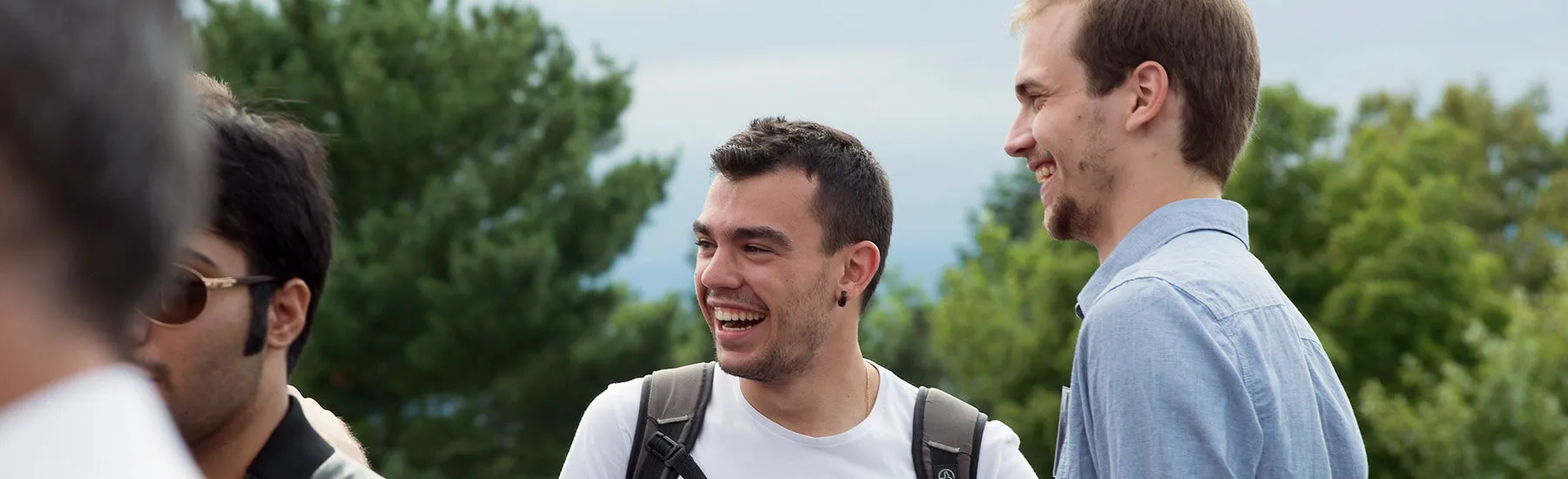 A group of people all laughing together