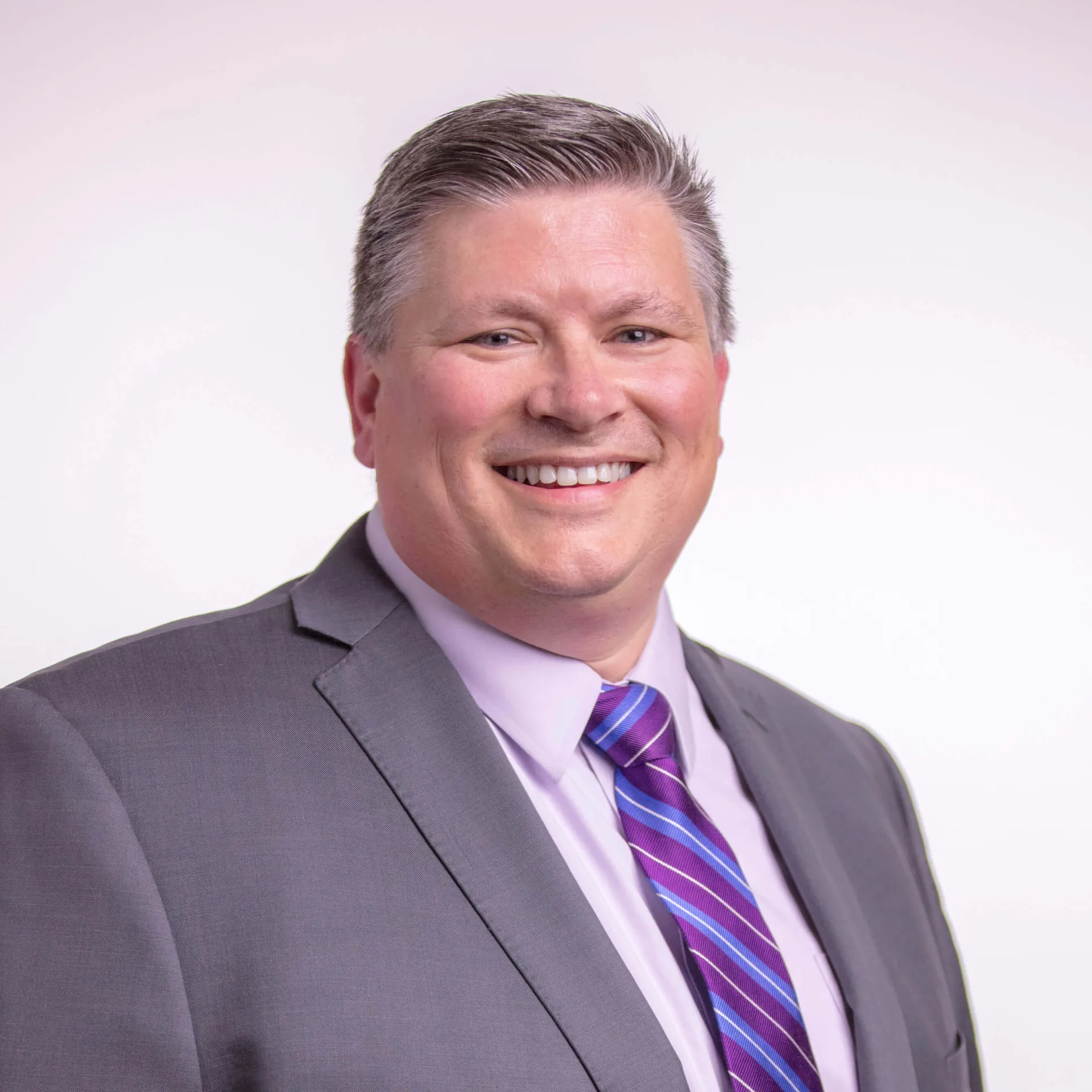 Department Chair smiling at camera