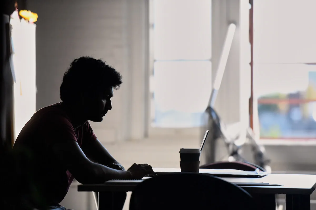 Person sitting at a computer 