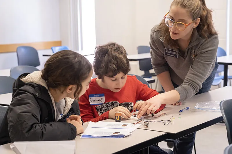 Students participate in a circuit building workshop