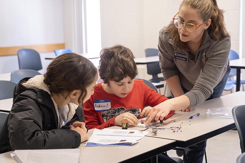 Students participate in a circuit building workshop