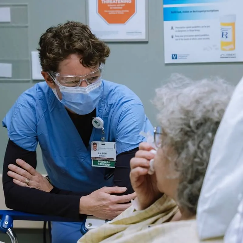 medical student chatting with patient