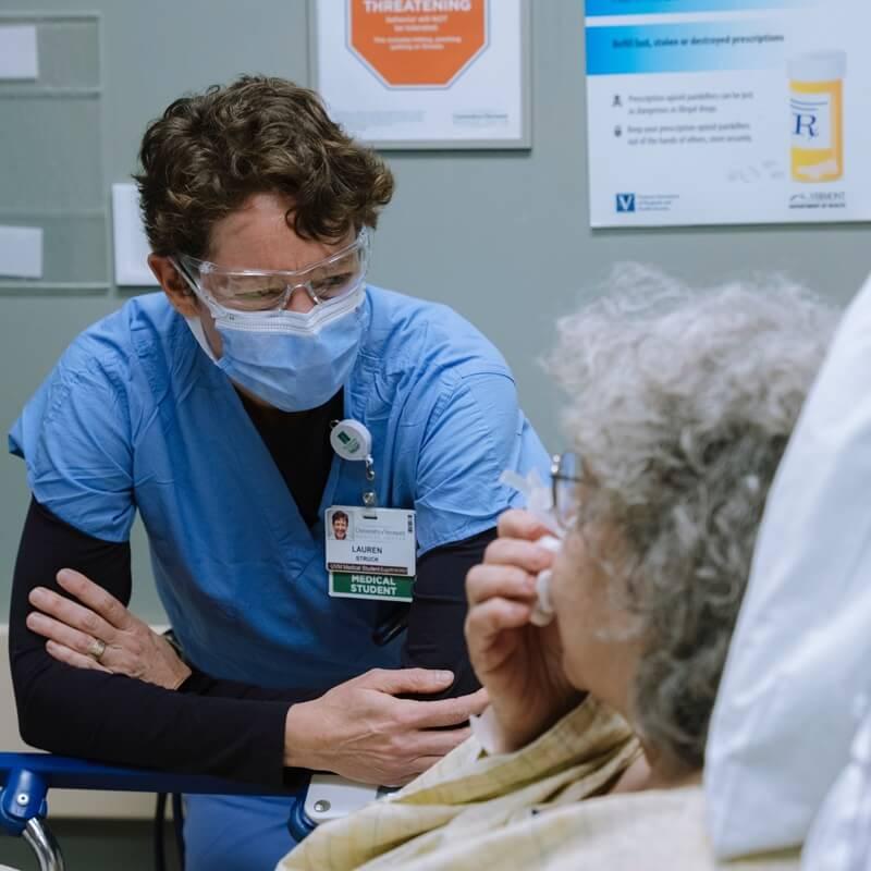 medical student chatting with patient
