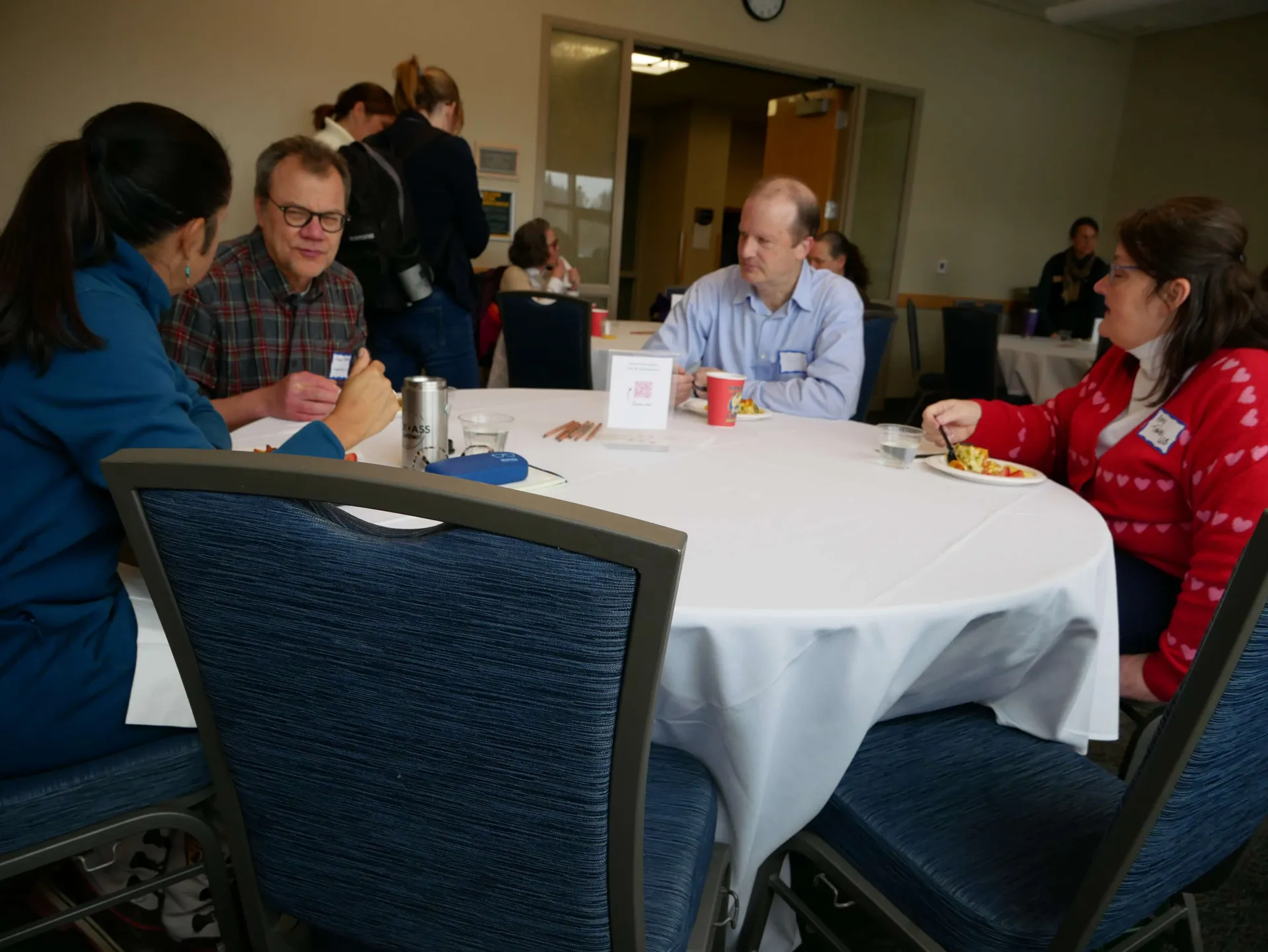 Faculty and staff enjoy breakfast in the Davis Center