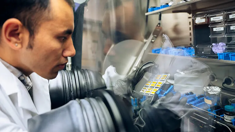 Researcher in physics lab