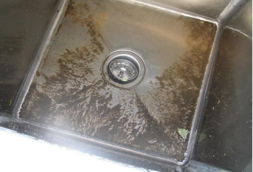 a sink with sediment in it