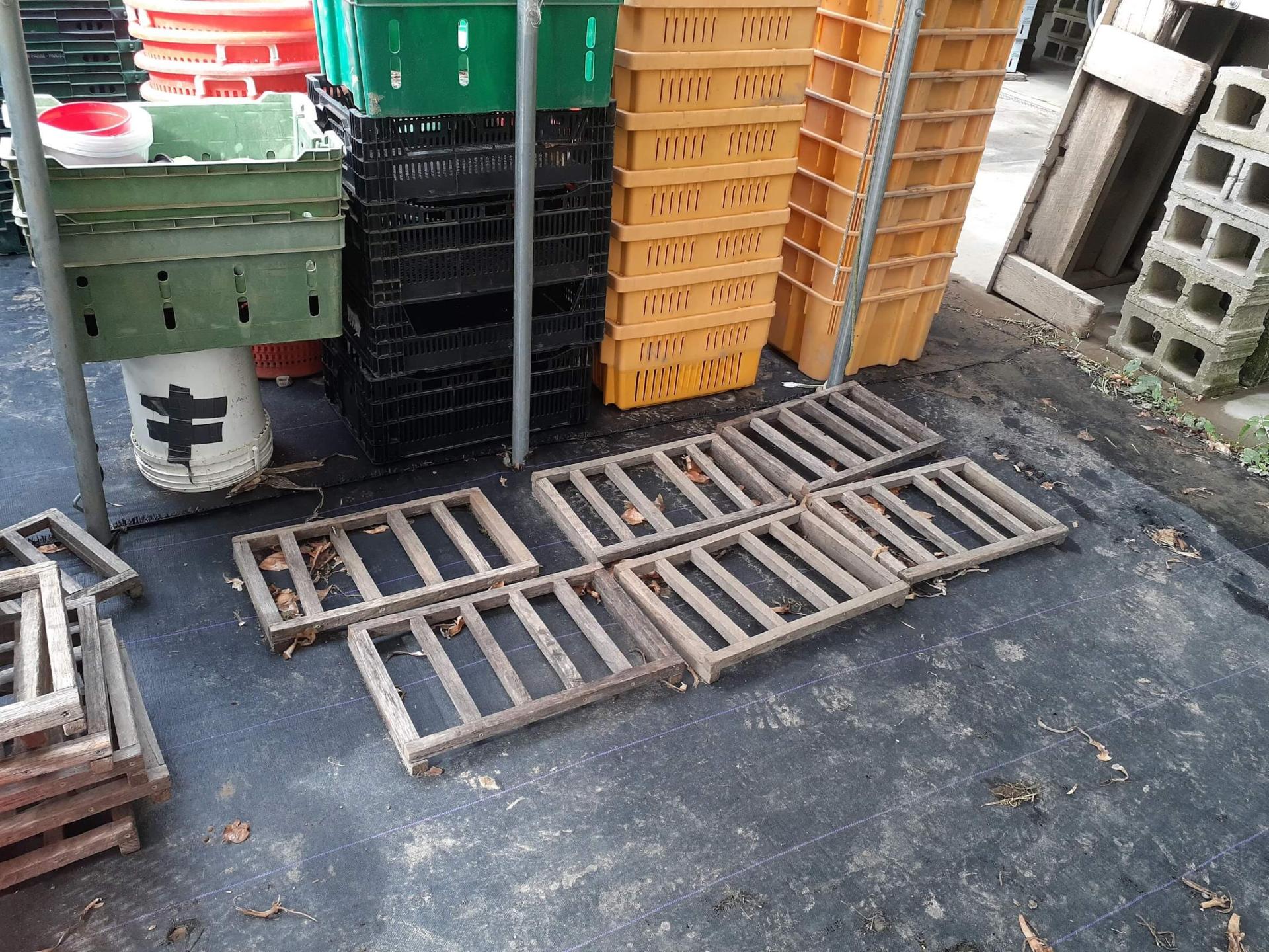 wooden pallets on a concrete floor