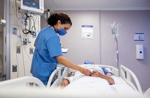 Clinician in emergency room with patient