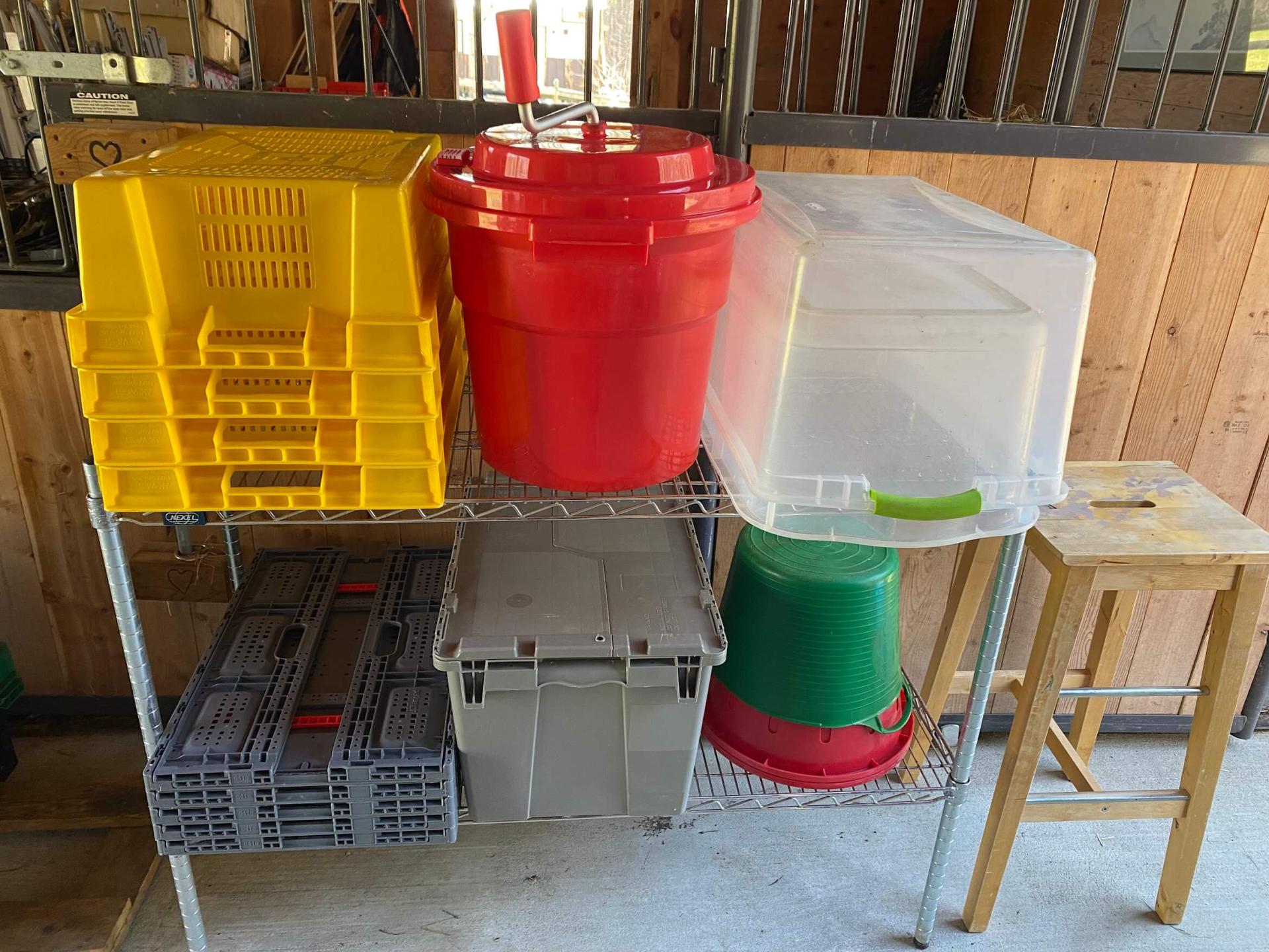 stacked plastic bins on a table