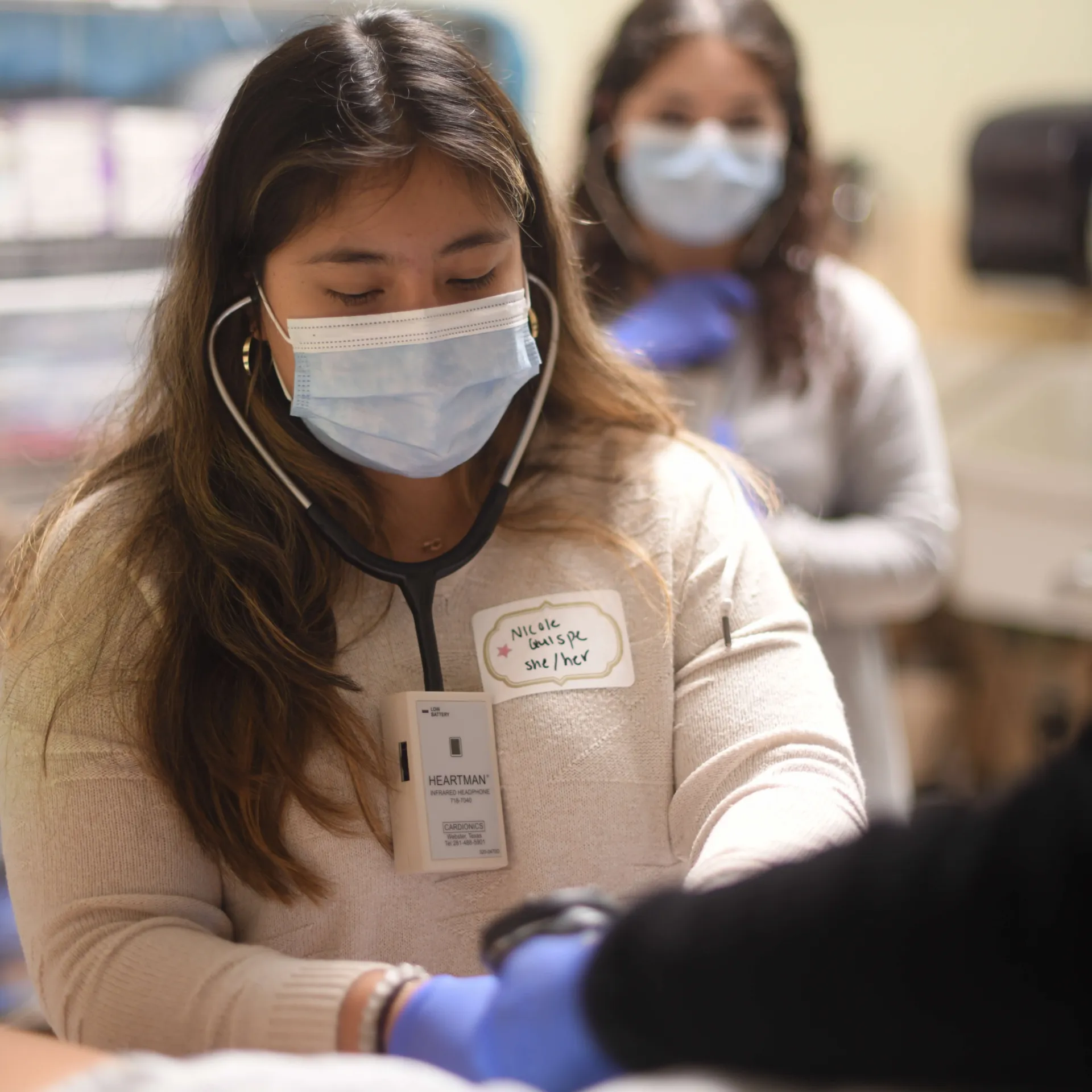 Students gaining first hand pediatric practice