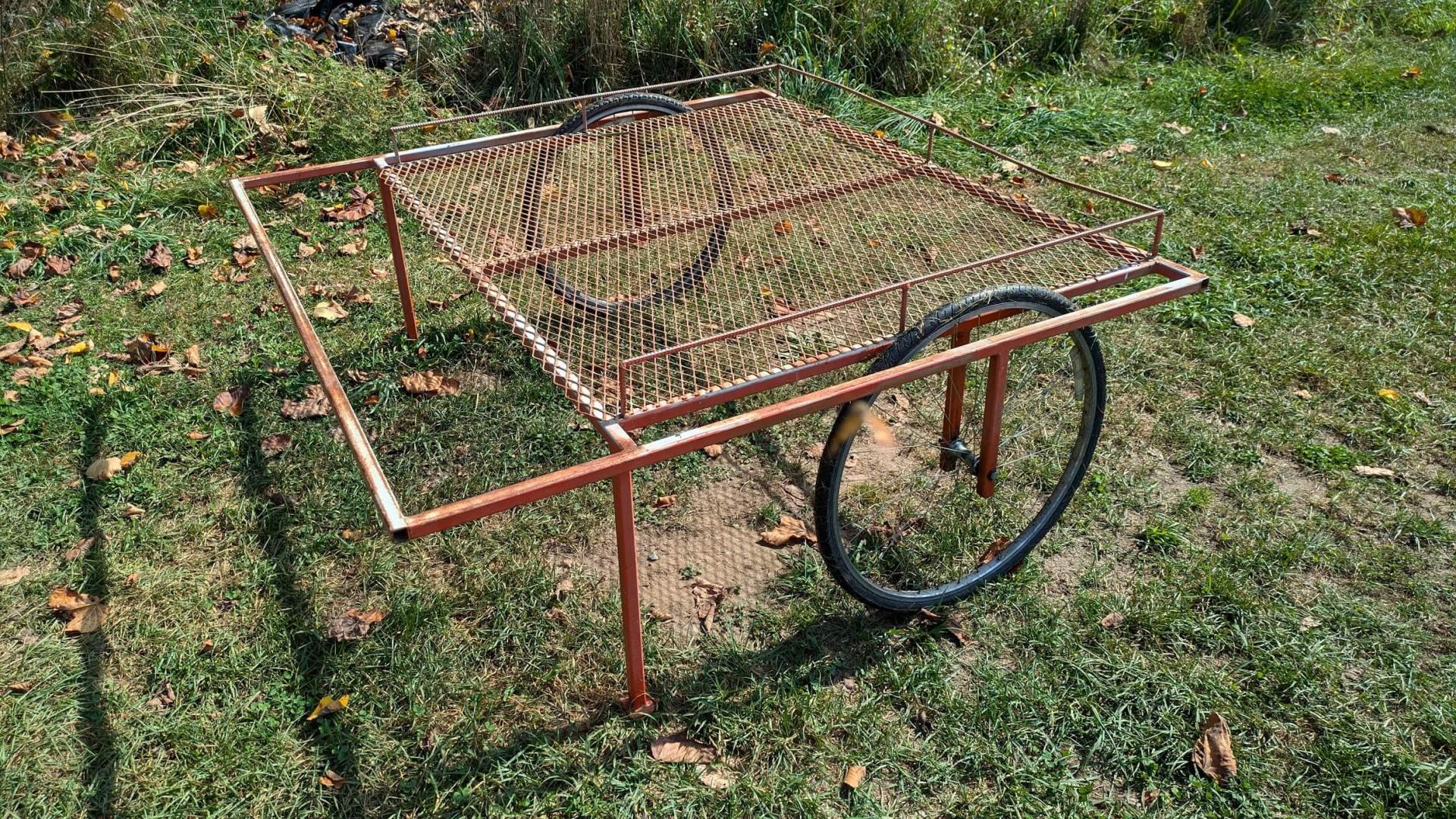 a spray table on wheels outdoors